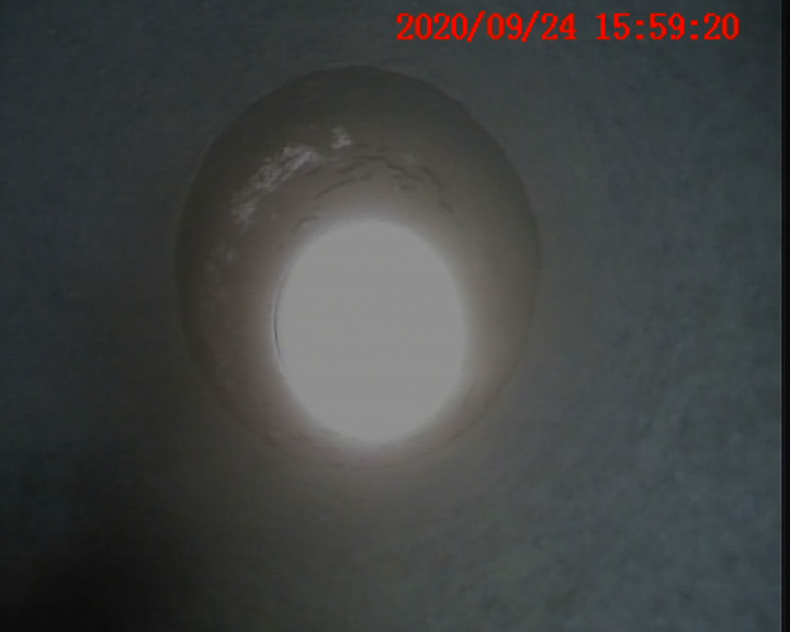 Pumice lounge flue liner termination inside chimney pot